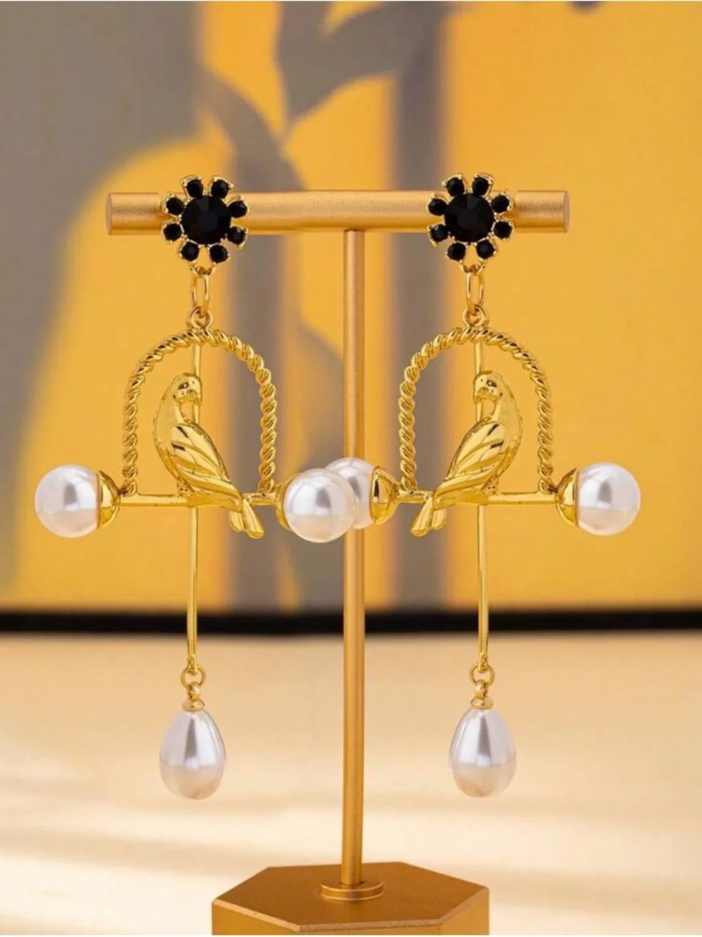 Gold Bird & Pearl Drop Earrings - Black Flower Accent